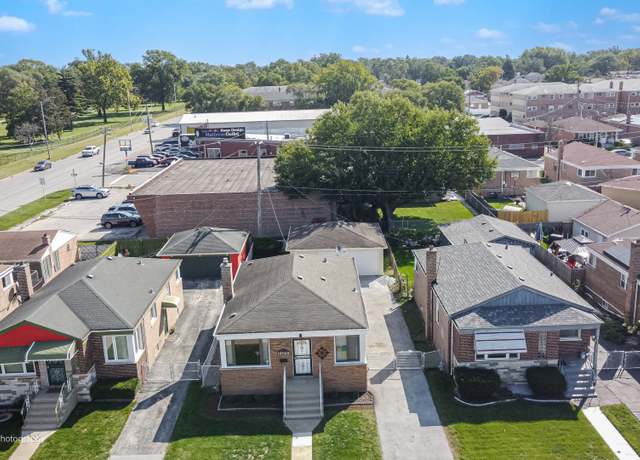 Property at 12709 S Racine Ave, Calumet Park, IL 60827, 4 beds, 2 baths