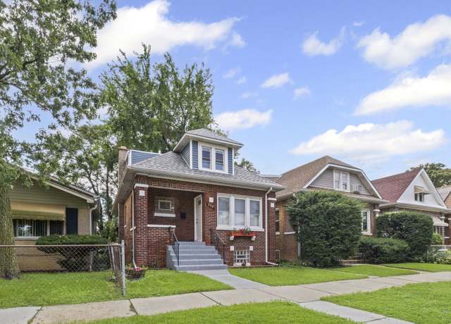 Property at 8915 S Racine Ave, Chicago, IL 60620, 6 beds, 3 baths