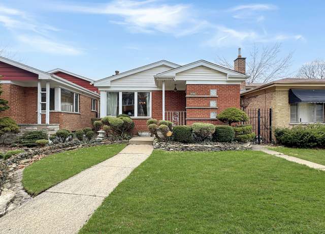 Property at 9706 S Prairie Ave, Chicago, IL 60628, 4 beds, 2 baths