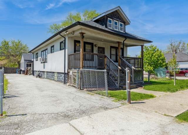 Property at 14910 S Wood St, Harvey, IL 60426, 5 beds, 3 baths
