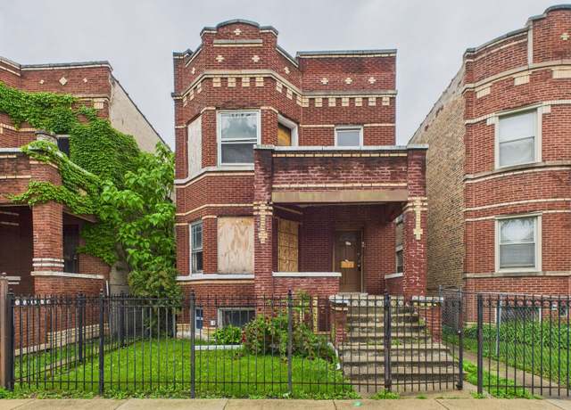 Property at 1019 N Leamington Ave, Chicago, IL 60651, 5 beds, 2 baths