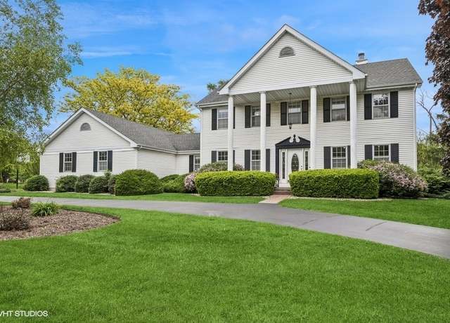 Property at 1302 Moraine Dr, Woodstock, IL 60098, 4 beds, 3.5 baths