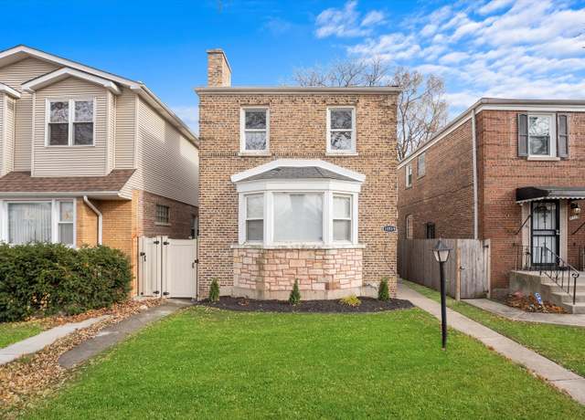 Property at 10519 S Eberhart Ave, Chicago, IL 60628, 3 beds, 2 baths