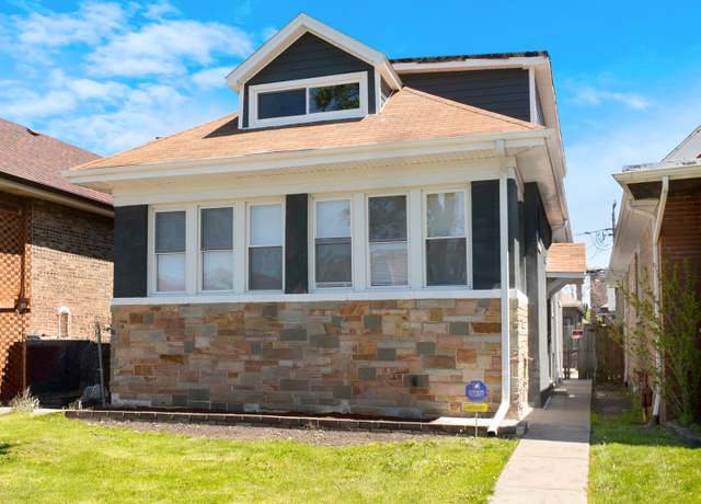 Property at 7755 S Wolcott Ave, Chicago, IL 60620, 5 beds, 3 baths