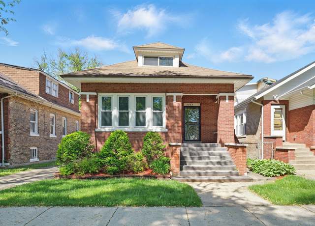 Property at 7744 S Oglesby Ave, Chicago, IL 60649, 3 beds, 2 baths