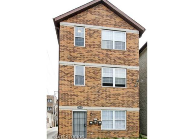 Property at 7915 S Phillips Ave, Chicago, IL 60617, 9 beds, 3 baths