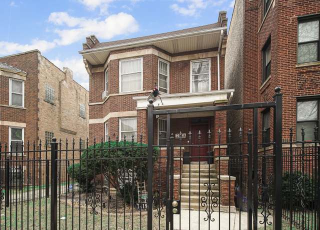 Property at 7419 S Coles Ave, Chicago, IL 60649, 4 beds, 2 baths