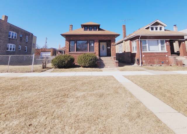 Property at 7542 S Prairie Ave, Chicago, IL 60619, 5 beds, 2 baths