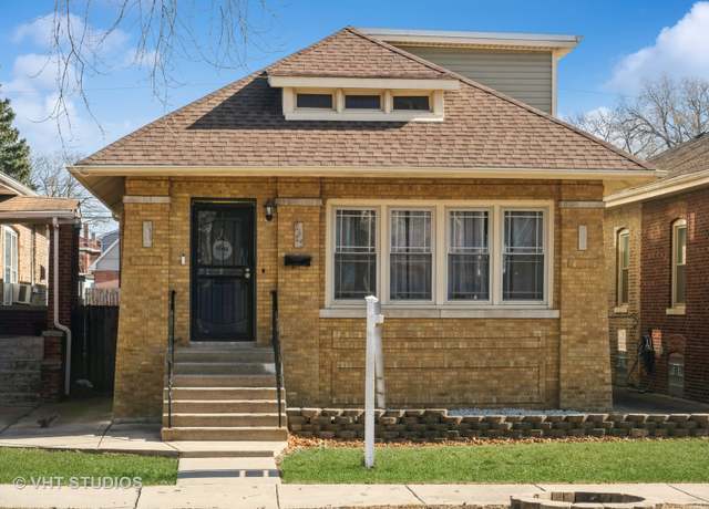 Property at 7427 S Bennett Ave, Chicago, IL 60649, 5 beds, 3 baths