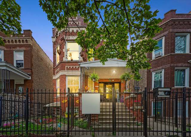 Property at 1916 N Lowell Ave, Chicago, IL 60639, 5 beds, 3 baths