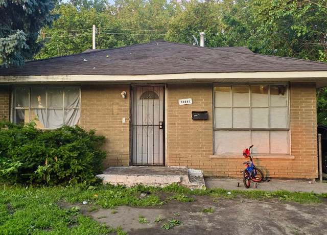 Property at 13041 S Eberhart Ave, Chicago, IL 60827, 4 beds, 2.5 baths