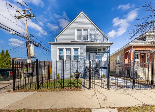 Property at 7115 S Rockwell St, Chicago, IL 60629, 4 beds, 2 baths