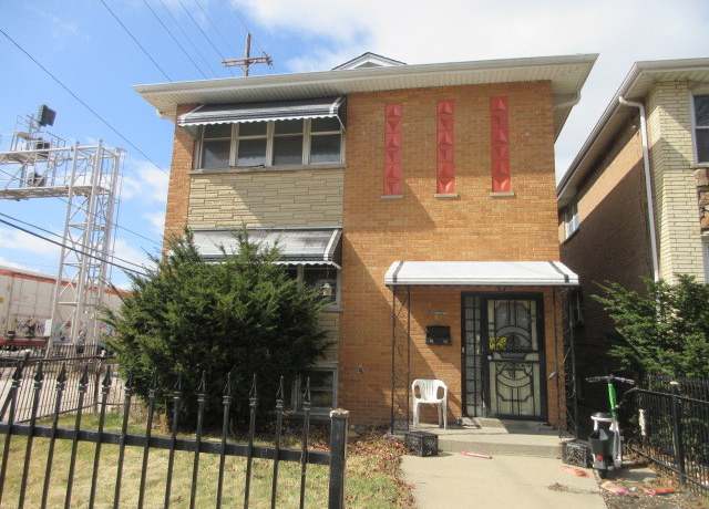 Property at 7448 S Maplewood Ave, Chicago, IL 60629, 5 beds, 2 baths