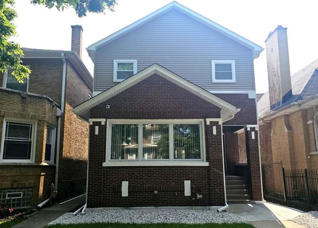 Property at 7741 S Bennett Ave, Chicago, IL 60649, 4 beds, 3.5 baths