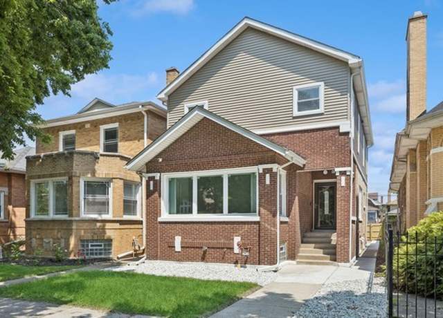 Property at 7741 S Bennett Ave, Chicago, IL 60649, 4 beds, 3.5 baths