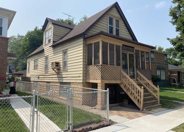 Property at 12336 S Lafayette Ave, Chicago, IL 60628, 5 beds, 3 baths