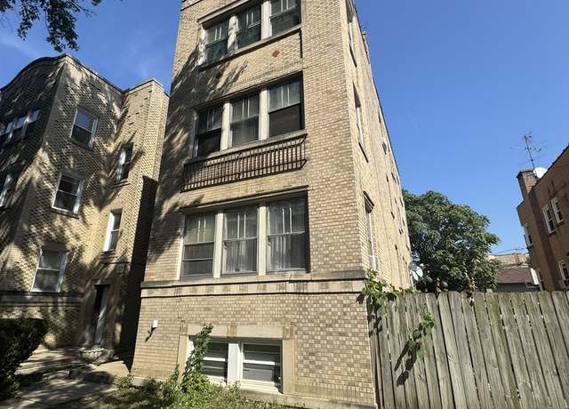 Property at 5709 N Spaulding Ave, Chicago, IL 60659, 7 beds, 4 baths