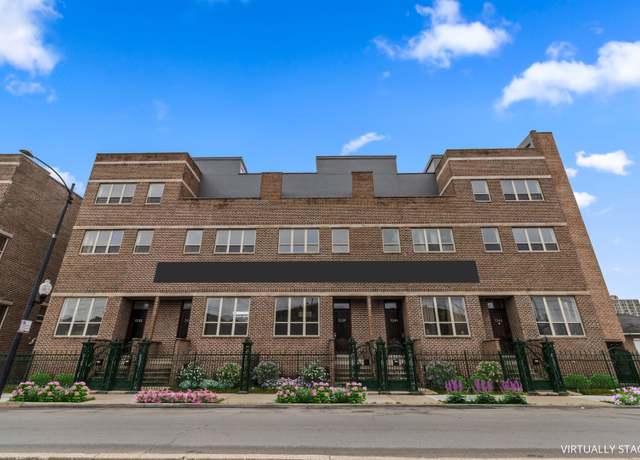 Property at 7237 S Exchange Ave, Chicago, IL 60649, 3 beds, 2.5 baths