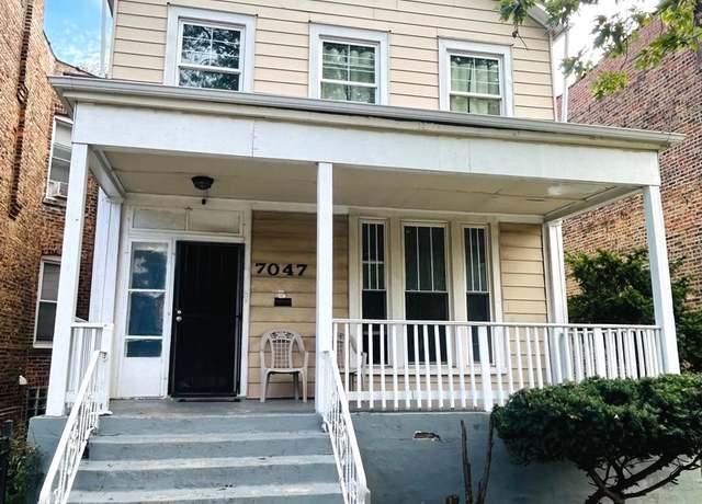 Property at 7047 S Eberhart Ave, Chicago, IL 60637, 5 beds, 2.5 baths
