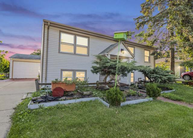 Property at 6710 Appletree St, Hanover Park, IL 60133, 4 beds, 2 baths