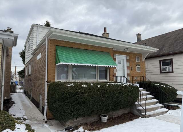 Property at 6037 S Mason Ave, Chicago, IL 60638, 5 beds, 3 baths