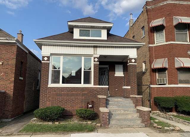 Property at 7644 S Vernon Ave, Chicago, IL 60619, 4 beds, 2 baths
