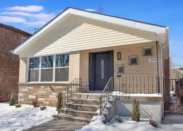 Property at 10718 S King Dr, Chicago, IL 60628, 4 beds, 2 baths