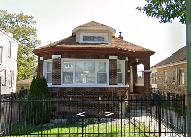 Property at 9031 S Marshfield Ave, Chicago, IL 60620, 5 beds, 2.5 baths