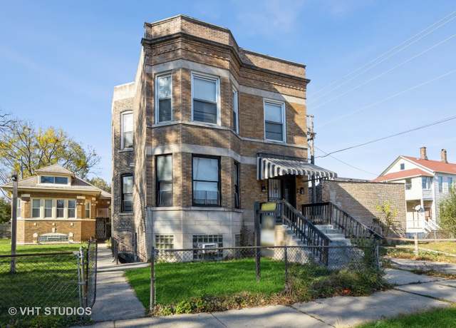 Property at 7514 S Dante Ave, Chicago, IL 60619, 8 beds, 3 baths