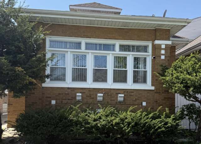 Property at 6510 S Campbell Ave, Chicago, IL 60629, 6 beds, 2 baths