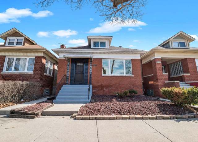 Property at 7621 S Luella Ave, Chicago, IL 60649, 4 beds, 3 baths
