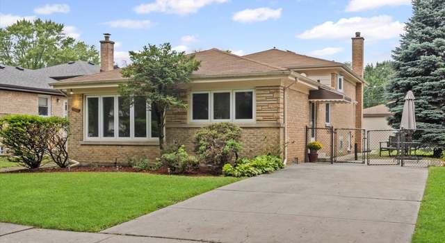 Property at 8720 Karlov Ave, Skokie, IL 60076, 4 beds, 2 baths