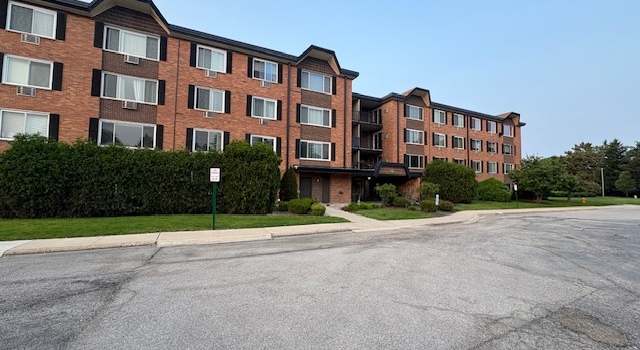 Photo of 1227 S Old Wilke Rd #104, Arlington Heights, IL 60005
