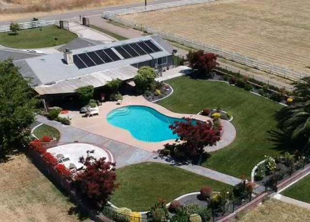 Property at 21055 S Corral Hollow Rd, Tracy, CA 95304, 4 beds, 3 baths