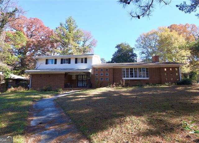 Property at 819 Venetta Pl NW, Atlanta, GA 30318, 5 beds, 3 baths