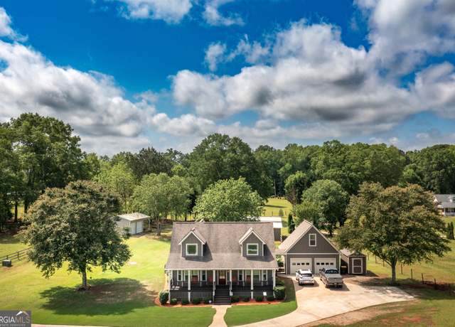 Property at 411 Hampton Rd, Fayetteville, GA 30215, 3 beds, 2.5 baths