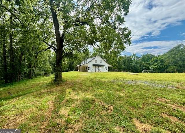Property at 677 Zebulon Rd, Milner, GA 30257, 2 beds, 2.5 baths