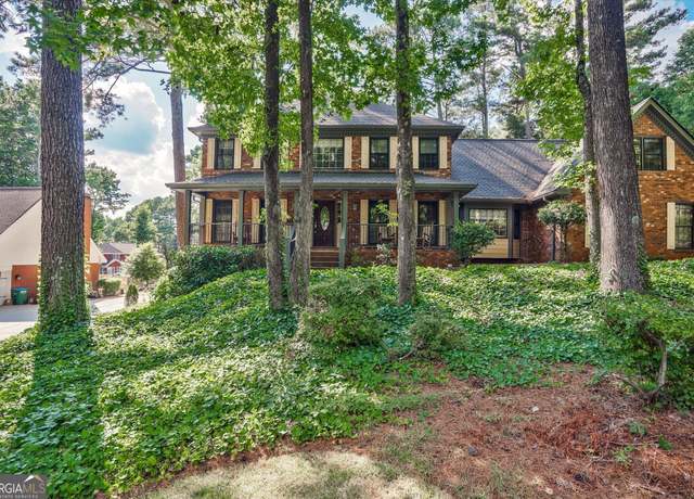 Property at 5741 Wolf Laurel Ln SW, Lilburn, GA 30047, 5 beds, 3 baths