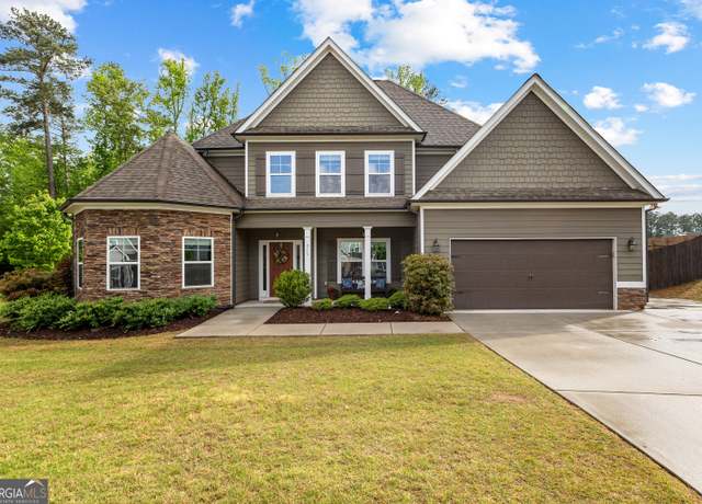 Property at 215 Duck Dr, Senoia, GA 30276, 5 beds, 3.5 baths