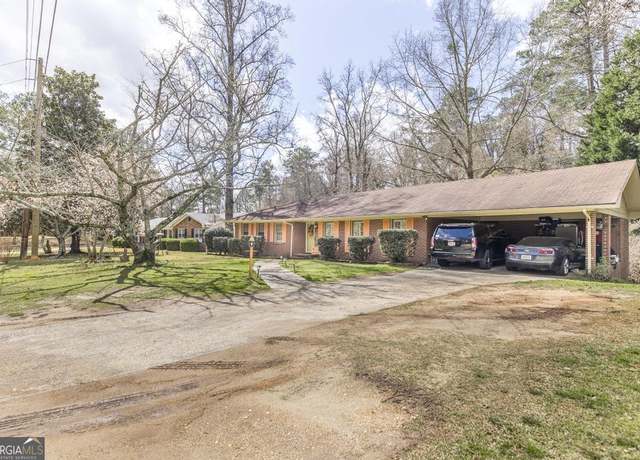 Property at 1970 Woodland Dr, Macon, GA 31211, 4 beds, 3 baths