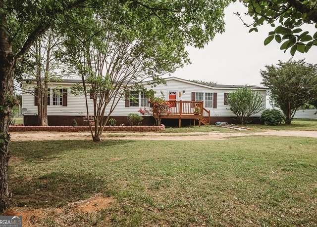 Property at 383 Jones Rd, Milner, GA 30257, 4 beds, 2 baths