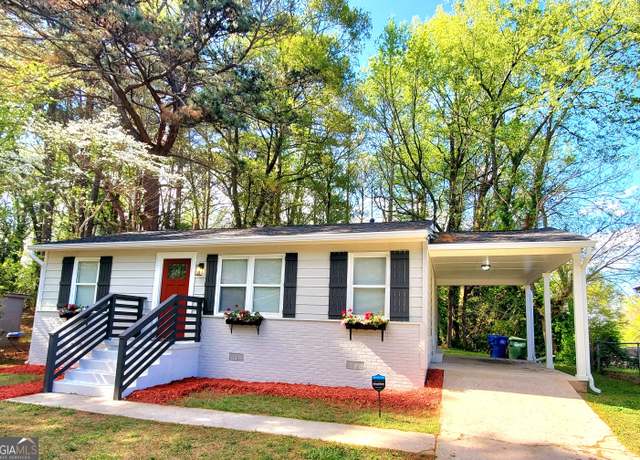 Property at 2825 Mango Cir NW, Atlanta, GA 30318, 4 beds, 2 baths