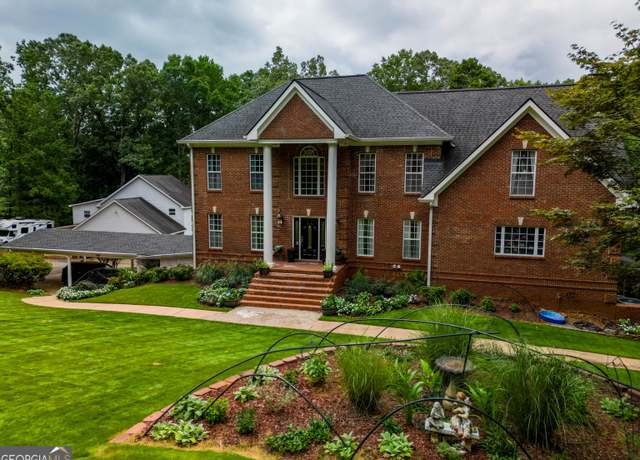 Property at 7488 Shadburn Ferry Rd, Cumming, GA 30041, 6 beds, 6 baths