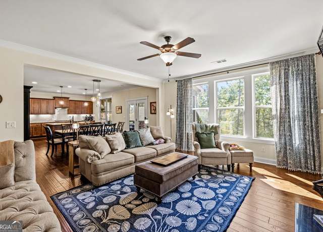 Property at 7143 Lake Edge Dr, Flowery Branch, GA 30542, 5 beds, 4.5 baths