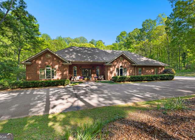 Property at 110 Woodland Rd, Fayetteville, GA 30214, 4 beds, 3.5 baths
