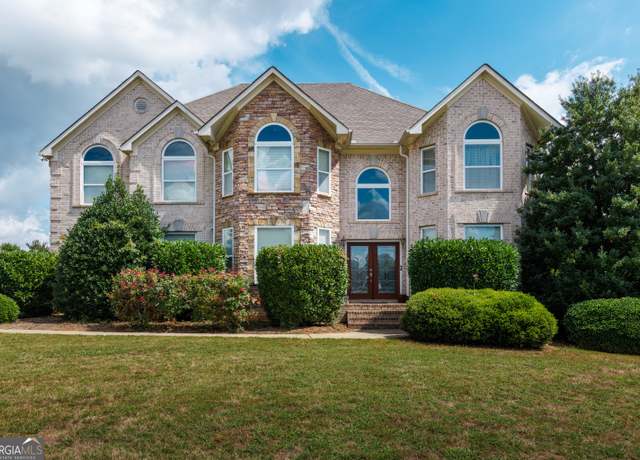 Property at 313 Masters Club Blvd, Hampton, GA 30228, 5 beds, 3.5 baths