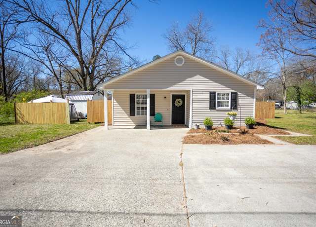 Property at 320 Harris St, Monroe, GA 30655, 4 beds, 2 baths