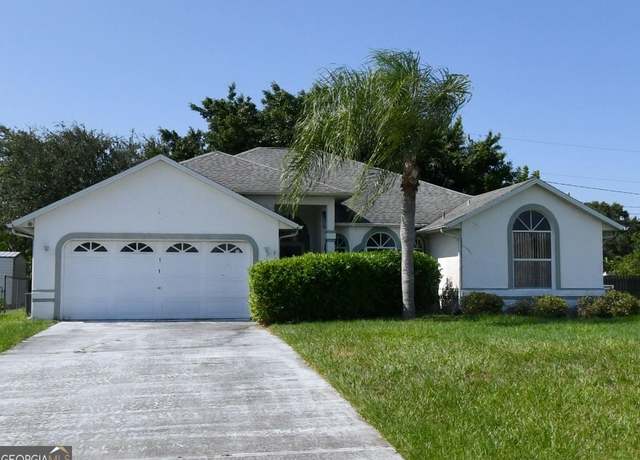 Property at 5718 NW North Macedo Blvd, Port Saint Lucie, FL 34983, 3 beds, 2 baths