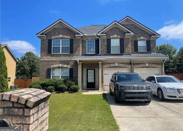 Property at 7729 Sylvaner Ln, Atlanta, GA 30349, 4 beds, 3 baths