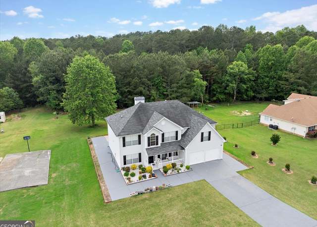 Property at 709 Mohansic Ave, Loganville, GA 30052, 6 beds, 3 baths
